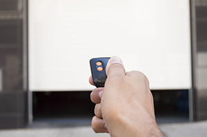 Garage door remote clicker